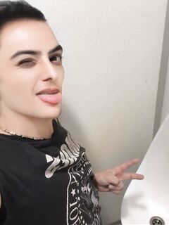 Femboy licks urinal at sports arena